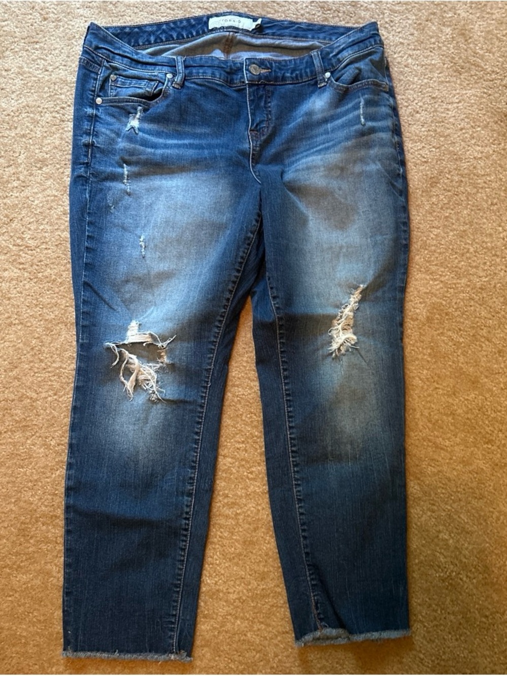 Torrid distressed knee hole jeans with raw hem size 14